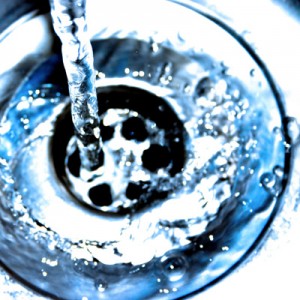 Water running down the drain.