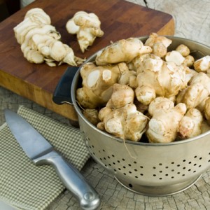 Sunchokes in a colander